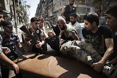 הקרבות נמשכים. מורדים בחלב, היום (צילום: AFP) (צילום: AFP)