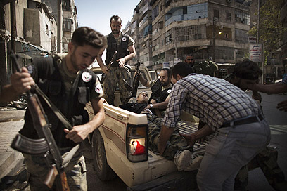 המורדים בסוריה. נלחמים גם באיראן וברוסיה? (צילום: AFP) (צילום: AFP)