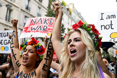 מפגינות נגד מלחמה (צילום: AFP) (צילום: AFP)