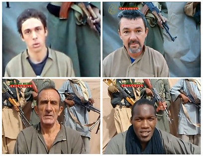 הצרפתים בידי שוביהם, מתוך סרטון וידאו שפרסמו החוטפים (צילום: AFP) (צילום: AFP)