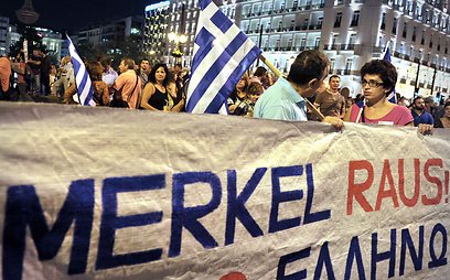 רוצים את מרקל בחוץ, ברחובות אתונה (צילום: AFP) (צילום: AFP)