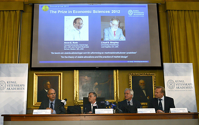 אלוין רות' ולויד שפלי, חתני פרס נובל לכלכלה 2012 (צילום: AFP) (צילום: AFP)