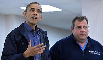 מושל ניו ג'רזי כריסטי לצד הנשיא אובמה (צילום: AFP) (צילום: AFP)