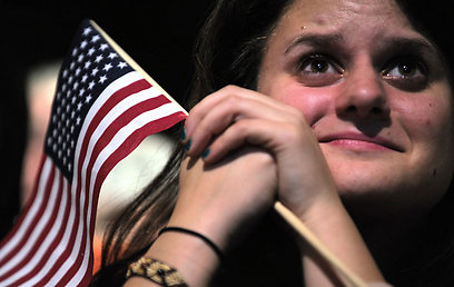 תומכת אובמה בחגיגת הניצחון. לא כולם בכו מאושר (צילום: AFP) (צילום: AFP)