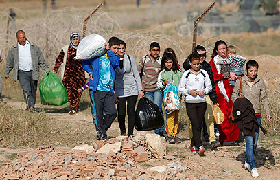 פליטים סורים בגבול טורקיה (ארכיון)        (צילום: רויטרס) (צילום: רויטרס)