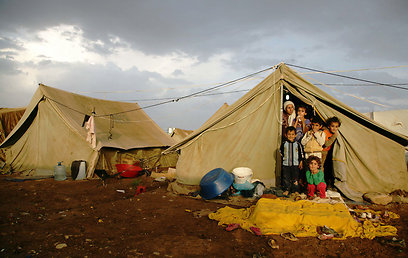 מוצאים מקלט במדינות שכנות. פליטים סורים (צילום: AFP) (צילום: AFP)