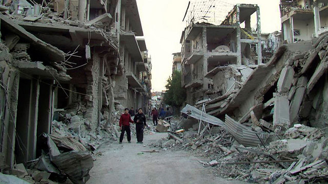 The aftermath of Syrian air force bombings (Photo: AP)