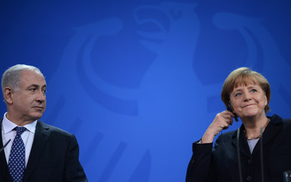 לקנצלרית גרמניה אין בממשלה שרים בלי תיק. מרקל ונתניהו (צילום: AFP) (צילום: AFP)