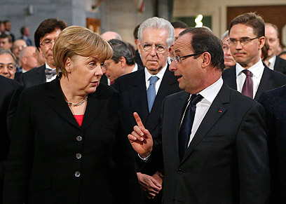 צרפת וגרמניה מתנגדות להצטרפות טורקיה לאיחוד. הולנד ומרקל (צילום: AP) (צילום: AP)