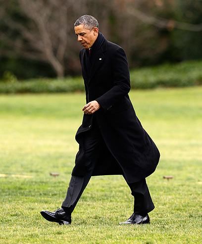 אובמה עם שובו השבוע לבית הלבן (צילום:AP) (צילום:AP)
