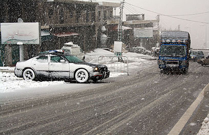 שלג כבד בדאר אל-ביידר שבהר הלבנון (צילום: AFP) (צילום: AFP)