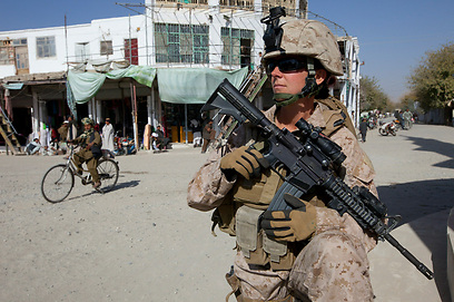 חיילת אמריקנית באפגניסטן           (צילום: Gettyimages) (צילום: Gettyimages)