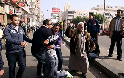 מתקשים לקבל את גזר הדין בפורט סעיד (צילום: AFP) (צילום: AFP)