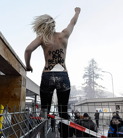 A protester at the Davos forum last year (Photo: AP/Archive)