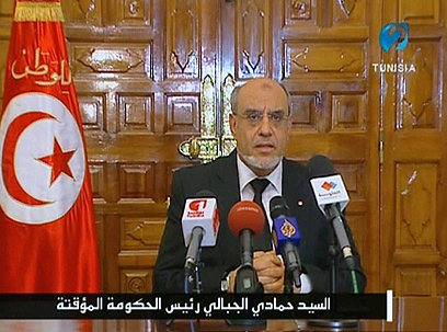 ההודעה הדרמטית של רה"מ חמאדי ג'באלי (צילום: AFP, TUNISIAN TV) (צילום: AFP, TUNISIAN TV)