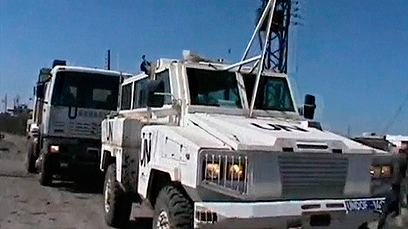 כלי הרכב של אנשי האו"ם החטופים (צילום: רויטרס) (צילום: רויטרס)
