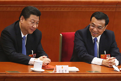 המנהיגים הבכירים של סין. הנשיא שי (משמאל) וראש הממשלה לי (צילום: Gettyimages) (צילום: Gettyimages)