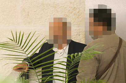 בני משפחתו של החשוד, היום בבית המשפט (צילום: עידו ארז) (צילום: עידו ארז)