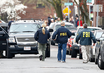 סוכני FBI במצוד אחר המחבלים. פישלו ב-2011? (צילום: AFP) (צילום: AFP)
