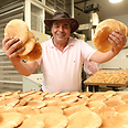 'Omar al-Saba' bakery. Selling pita bread to Americans 