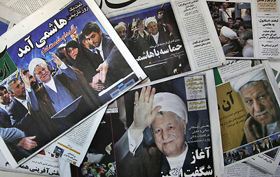 העיתונים באיראן לקראת הבחירות (צילום: AP) (צילום: AP)