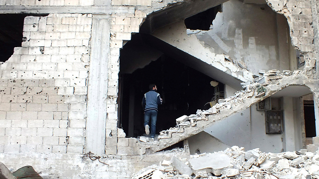 Destruction in Homs (Photo: Reuters)