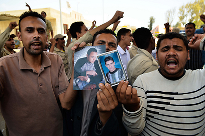 הפגנה ברפיח המצרית למען שחרור החטופים (צילום: AFP) (צילום: AFP)