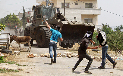 Palestinian stone throwers. Archive (Photo: AFP)