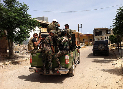 חיזבאללה במבוכה. לוחמים באל קוסייר  (צילום: AFP) (צילום: AFP)