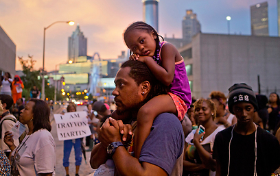 הפגנת מחאה באטלנטה בעקבות זיכויו של ג'ורג' זימרמן (צילום: AP) (צילום: AP)