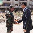 Assad with Syrian army soldier