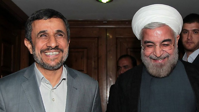 Ahmadinejad with current president and possible future rival, Hassan Rouhani (Photo: AFP)