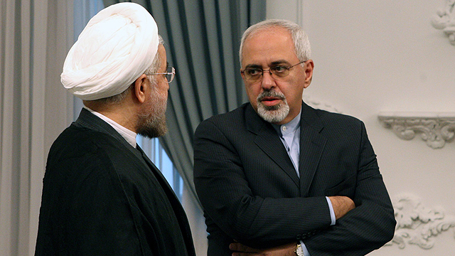 שר החוץ זריף (מימין) עם נשיא איראן רוחאני (צילום: EPA) (צילום: EPA)