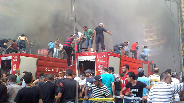 Bombing in Dahiyeh (Photo: AFP)