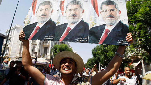 A pro-Morsi demonstration in Tunisia in 2013 (Photo: Reuters)