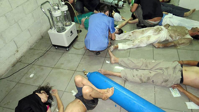 Treating wounded in local infirmary (Photo: AFP PHOTO / HO / KFAR BATNA MEDIA CENTRE)