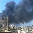 Smoke rising over Tripoli