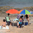 Families visit northern beach despite rockets