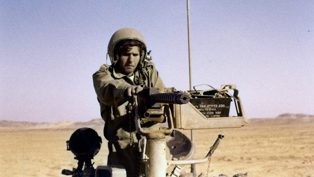 IDF soldier Haim Ichnold atop a tank in Sinai during the Yom Kippur War (Photo: David Rubinger) (Photo: David Rubinger)