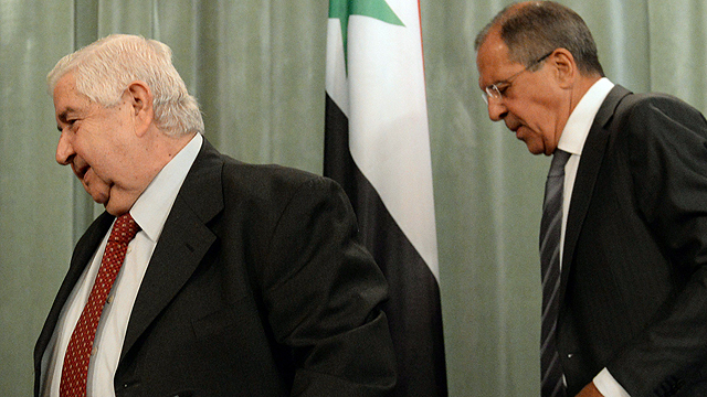 שר החוץ לברוב ומקבילו הסורי, ואליד אל מועלם (צילום: AFP) (צילום: AFP)