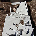 Smashed Christian grave