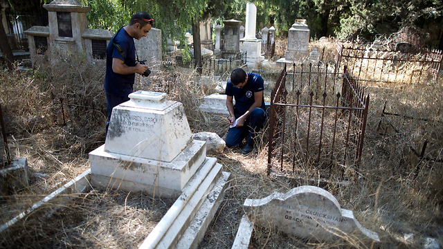 Christian tombstones vandalized (Photo: EPA)