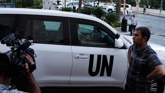 "נחגוג אחרי שנשלים את המשימה". אנשי האו"ם בסוריה (צילום: רויטרס) (צילום: רויטרס)