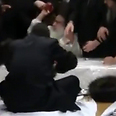 Sanz Klausenburg Rebbe throwing apples into crowd 