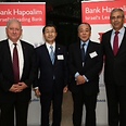 Kenan (R) and Seroussi (L) with heads of Japan's Mizuho Bank 