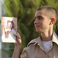 Natan Aminov with photo of his mother