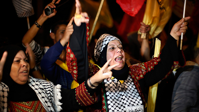 Palestinians celebrate prisoner release in Ramallah (Photo: Reuters)