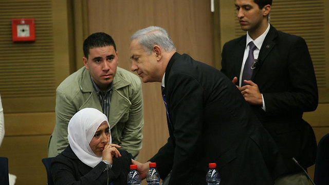 PM Netanyahu consoled Agbaria in 2012 (Photo: Gil Yohanan)