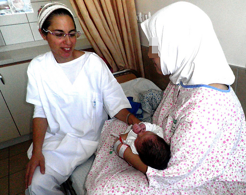 A refugee Syrian mother gives birth in Ziv Medical Center this month (Photo: Hanna Bickel)