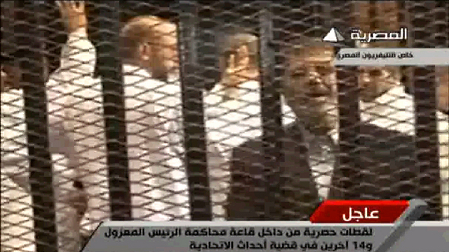 Morsi on trial (Screen capture from Egyptian television)